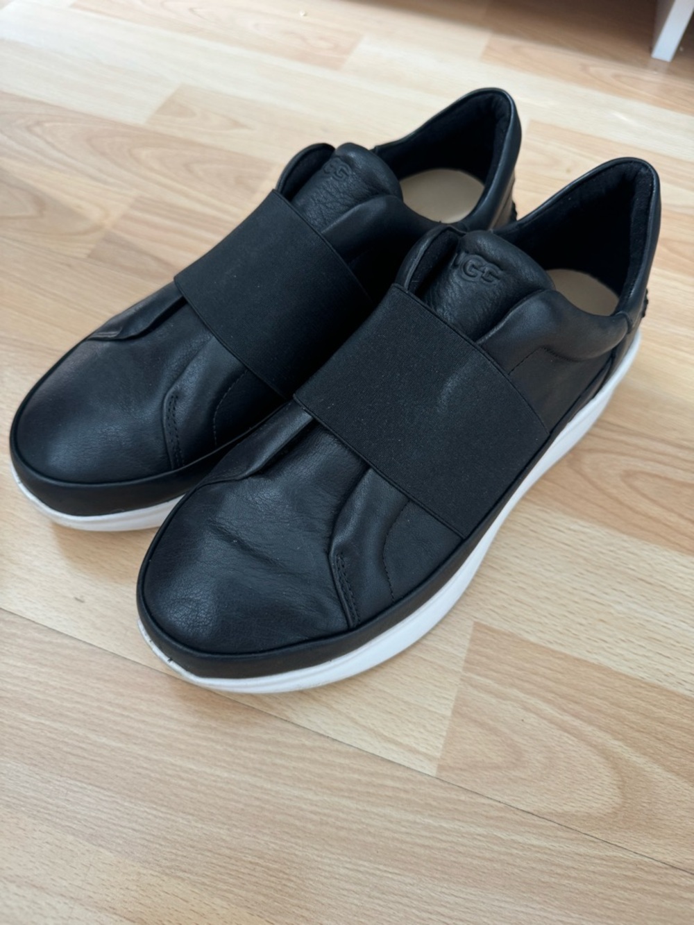 UGGs Black Leather Slip-On Sneakers with White Sole
